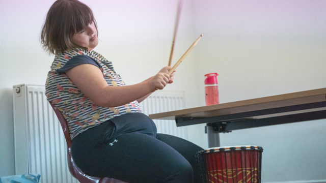 Student playing the drums