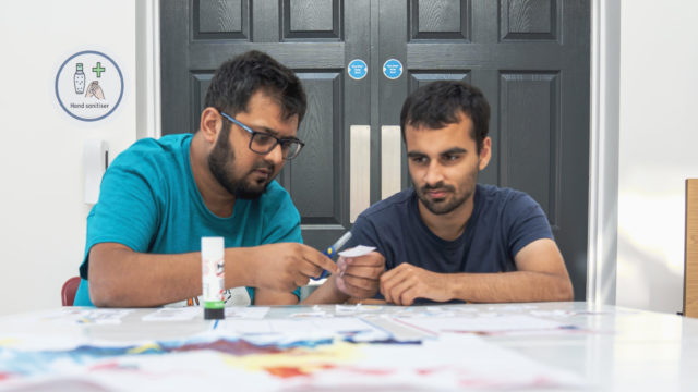 Learning Support Assistant helping student in the classroom