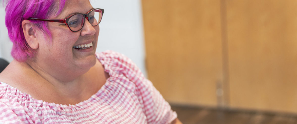 Staff member laughing