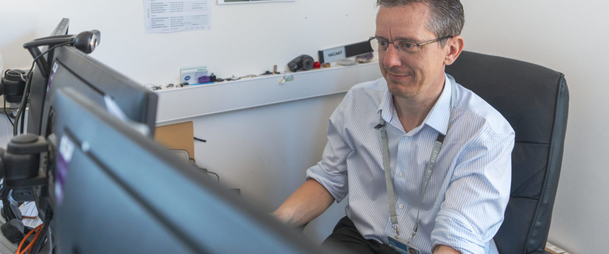 Staff member working on computer