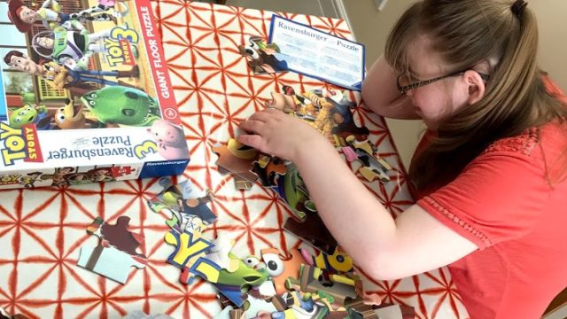 Day Service member completing a jigsaw