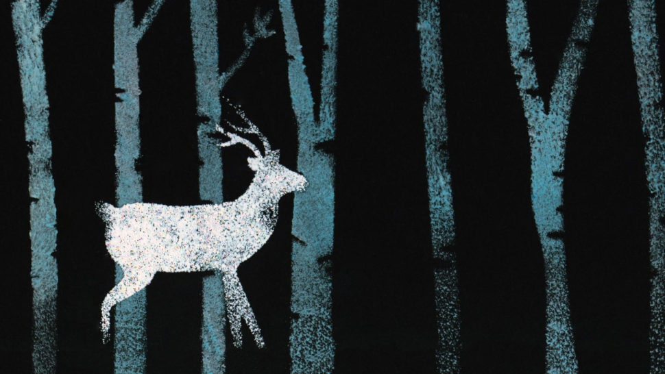 Metal-printed deer in a wood