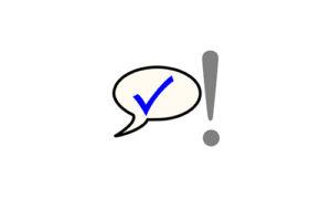 Symbol of speech bubble with a tick