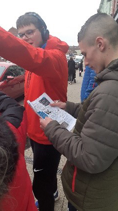 Students looking at map instructions