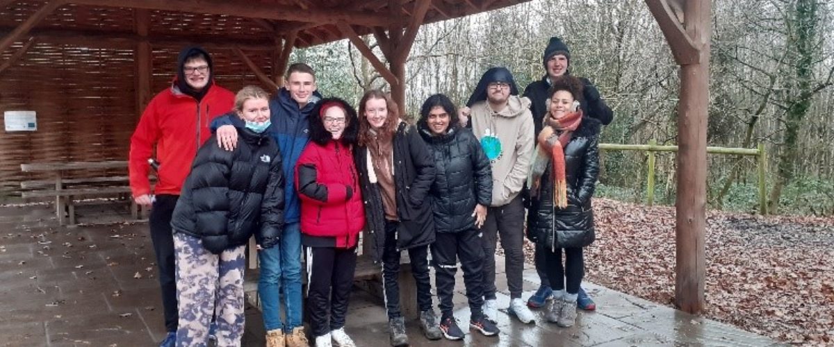 Students sheltering under canopy at the Outwoods, Loughborough