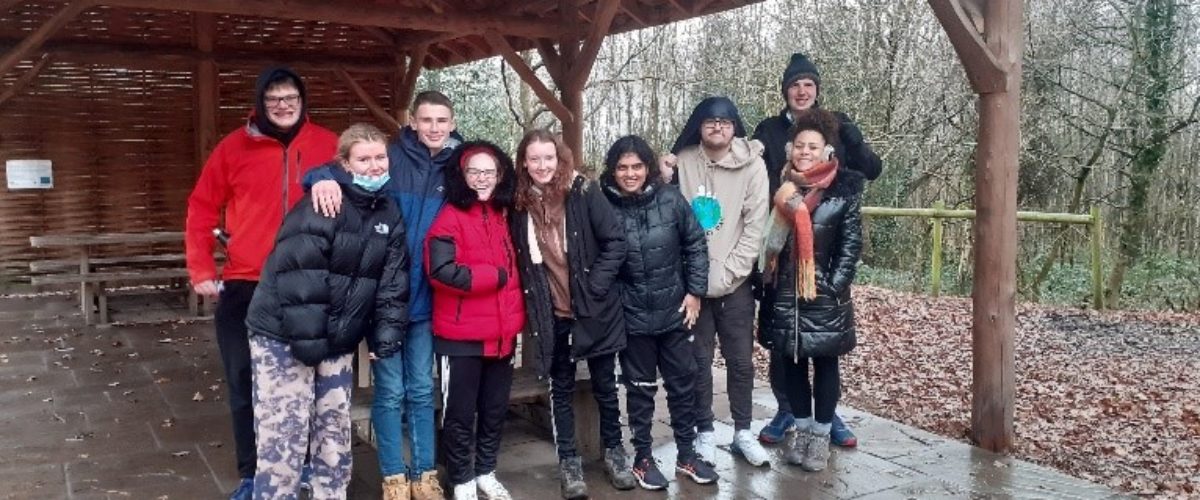 Students sheltering under canopy at the Outwoods, Loughborough