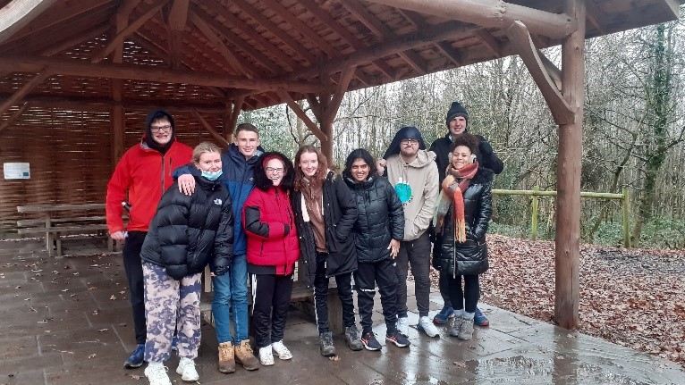Students sheltering under canopy at the Outwoods, Loughborough