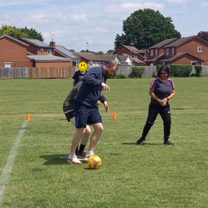 girl helping out at sports day