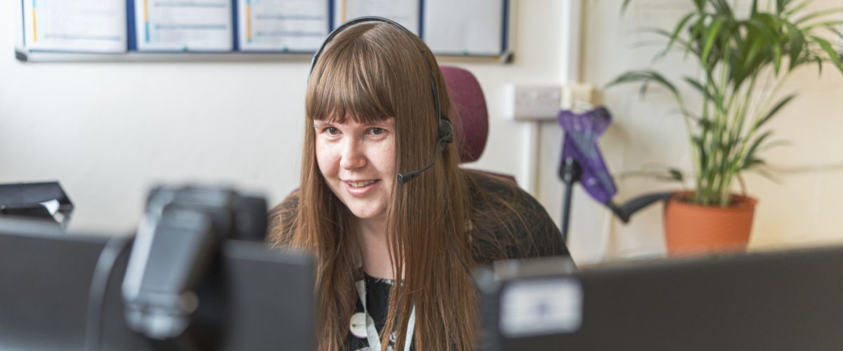 Staff member working at their computer