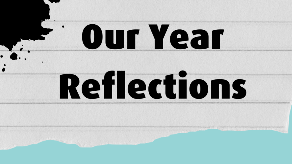 text on notebook paper, text reads: 'Our Year Reflections'