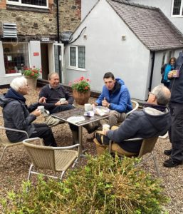 Boy chatting to volunteers