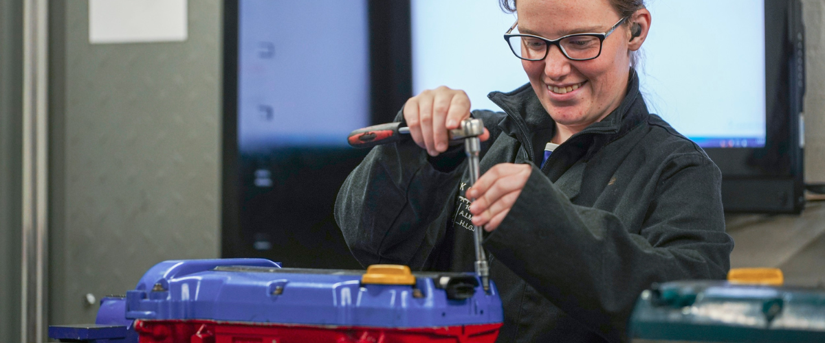 Student working on an engine