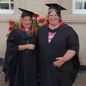 Tutors at graduation outside Loughborough Town Hall