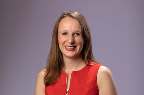 Headshot of Kari Griffiths smiling at the camera