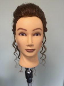 Curled updo on a mannequin
