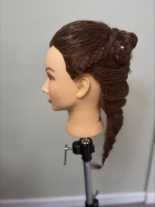 Plaited hair on a salon mannequin