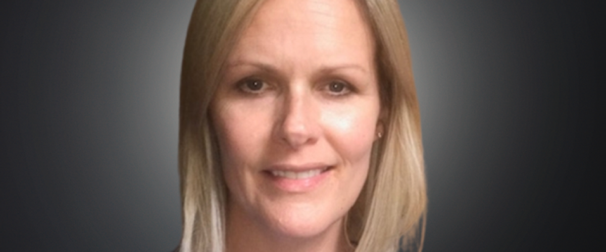 Headshot of trustee Emma Hunt, smiling at the camera