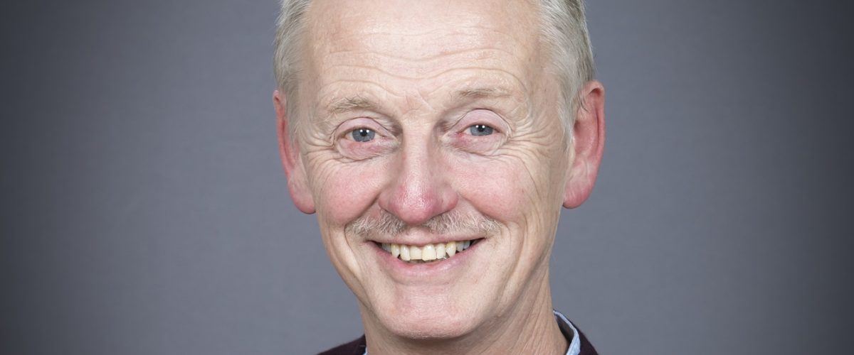 Headshot of trustee David Jackson, smiling at the camera