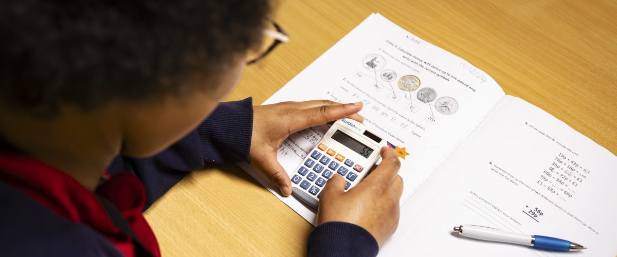 Student using a calculator