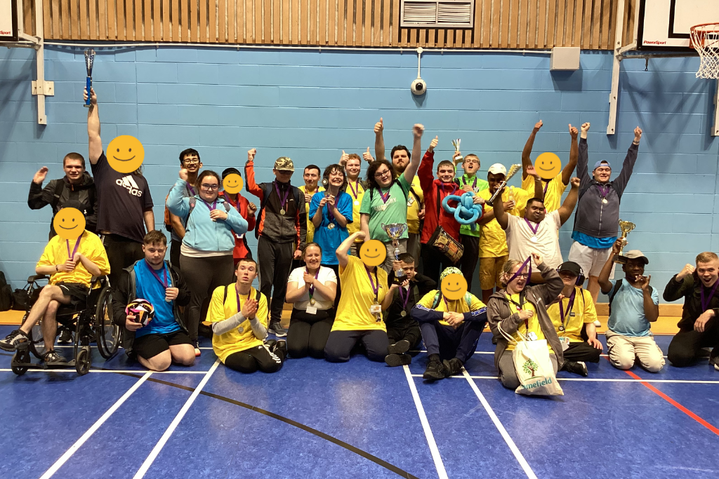 Image of a group of Homefield students holding trophies and celebrating.