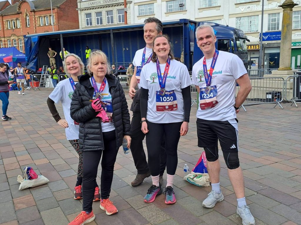 A team photo of some of our Team Homefield runners. From left to right: Danni, Tracey, Paul, Jody and Chris.