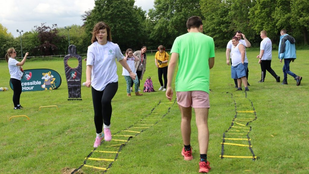 The attending students doing a rugby ladder drill