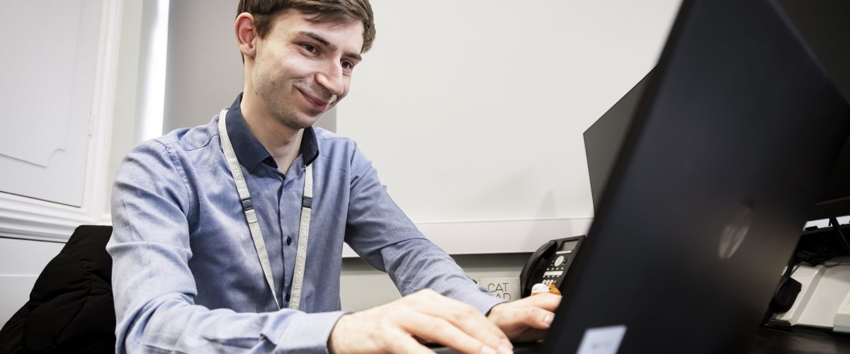 Staff member using the computer