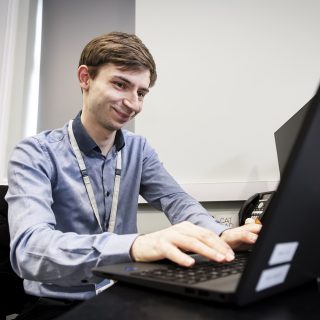 Staff member using the computer