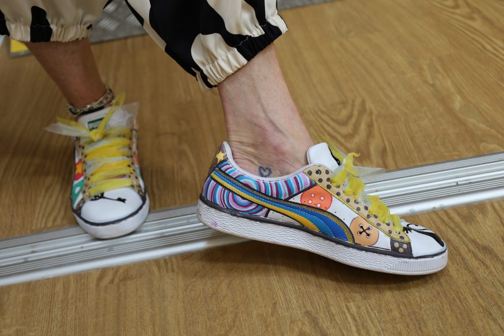 Close up of Coraline inspired trainers