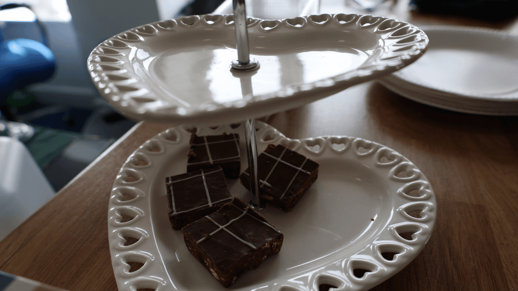 a heart-shaped tray with multiple brownie slices on it